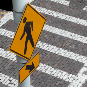 Pedestrian crossing sign to prevent accidents when crossing the road street